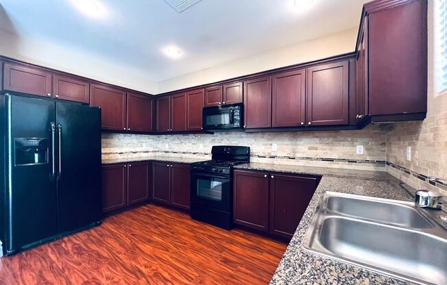 Gorgeous two story 4 bedroom family home! Upstairs there is a spacious loft and downstairs there is bedroom and 1 1/3 bathroom downstairs!