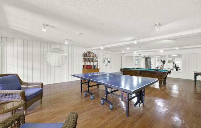 a game room with a ping pong table at Camino de Oro Apartments, California, 90505