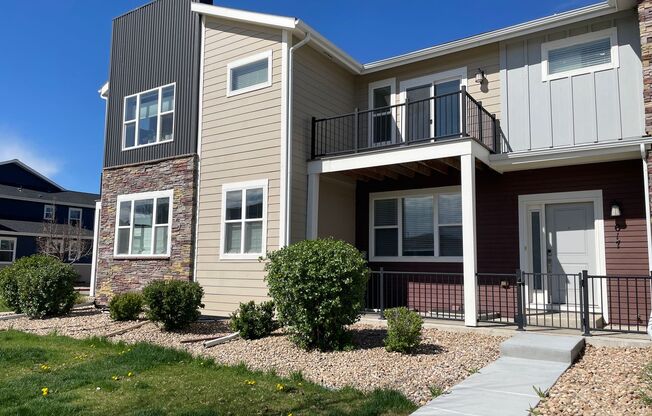 Spacious 3 level, 4 bedroom townhome with attached 2 car garage at Silver Meadows Townhomes on Longmont.