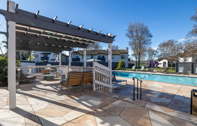 our apartments have a pool and a clubhouse with a pergola