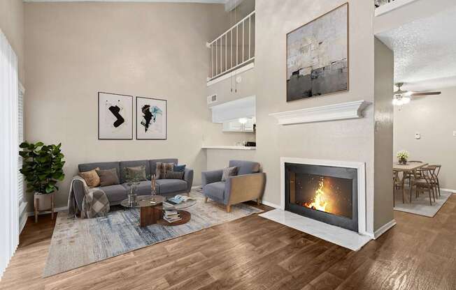 Virtually staged b2 living room at Noel on the Parkway in Dallas, TX