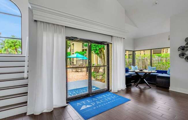 A room with a blue mat on the floor that says "Atlantic".