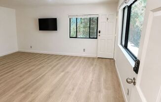 A fully furnished 3 bedroom, 2 bathroom apartment with common areas at 1823 Pelham Ave. Unit 3