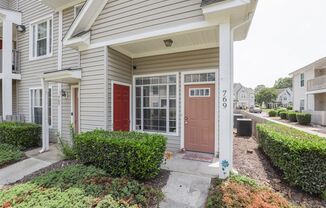 Cathedral Ceilings & Coastal Vibes—This 2BR/2BA VB Condo Has It All!