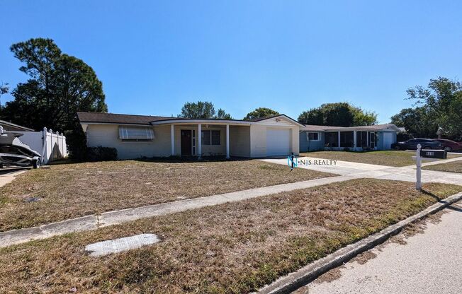 Gorgeous 2/1/1 1100 Sq. Ft. with HUGE kitchen/great room combo, tile floors throughout, BONUS ROOM & a fenced in yard!!!!