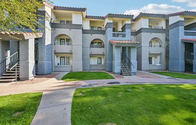 Stillwater Apartments with a walkway in front.