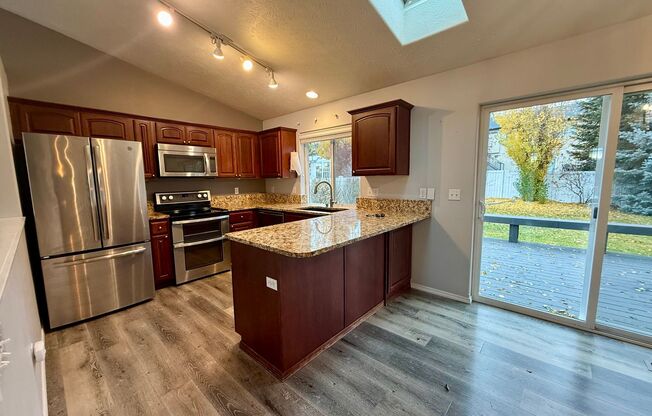 Stunning 3 Bed 2 Bath Eagle Ridge Home w/ Large Fenced Backyard and Raised Deck!