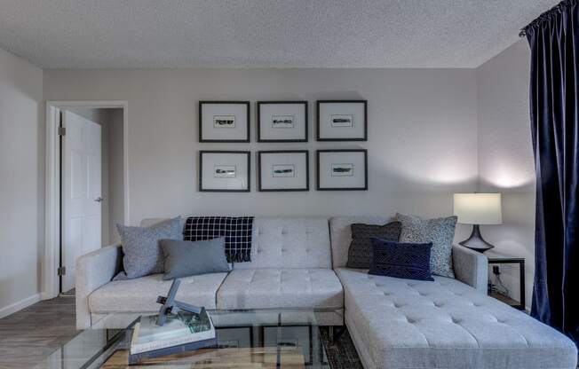 a living room with a couch and a coffee table