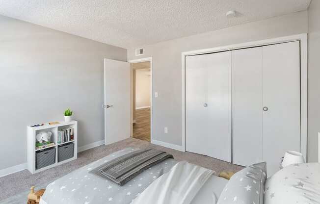 Model Bedroom with Carpet at Indigo Park Apartments in Albuquerque, NM.