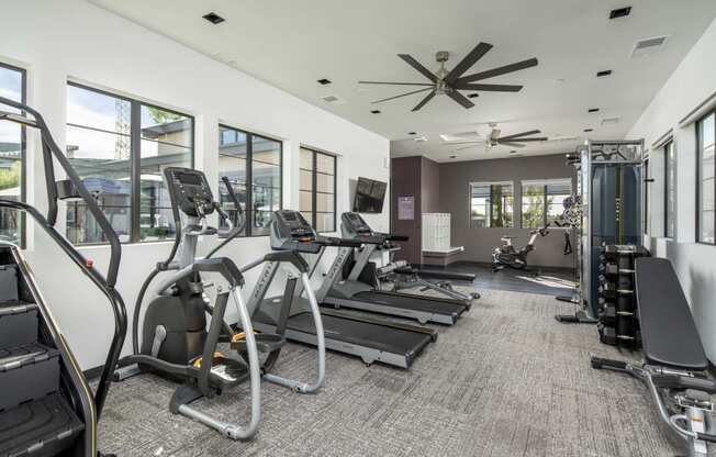 the gym is equipped with treadmills and other exercise equipment at Grandstone at Sunrise, Peoria, AZ