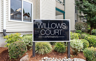 Welcome sign at Property Building at Willows Court Apartment Homes, Seattle, WA