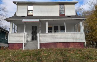 A charming 3-bedroom, 1.5-bathroom home located in the vibrant city of Akron