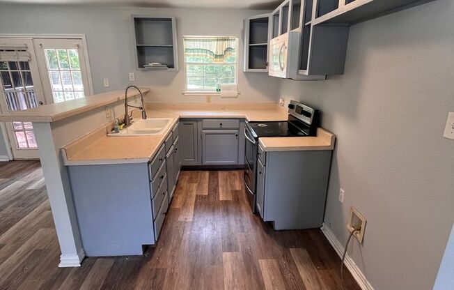 3 Bed , 2 bath on a .5 acre lot.