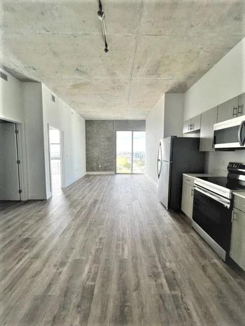 a row of white and black hearts on the floor