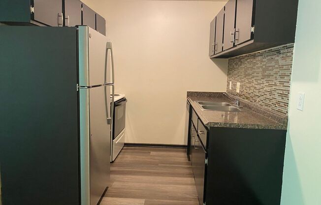 2 beds, 1.5 baths, 1,060 sqft, $1,325, Unit 7700-309