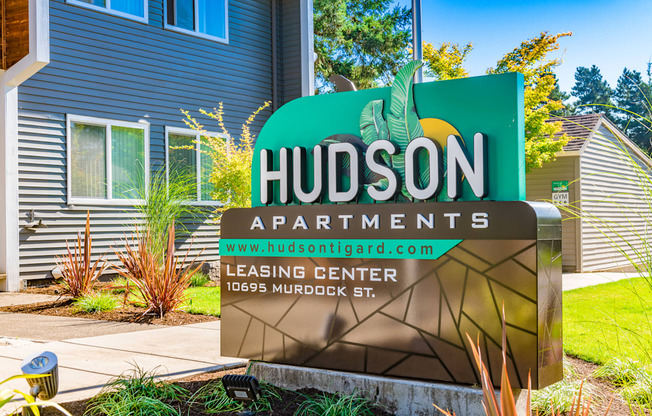 a picture of the hudson apartments sign
