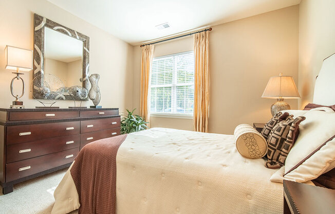 Bedroom With Expansive Windows at Rose Heights Apartments, Raleigh, North Carolina