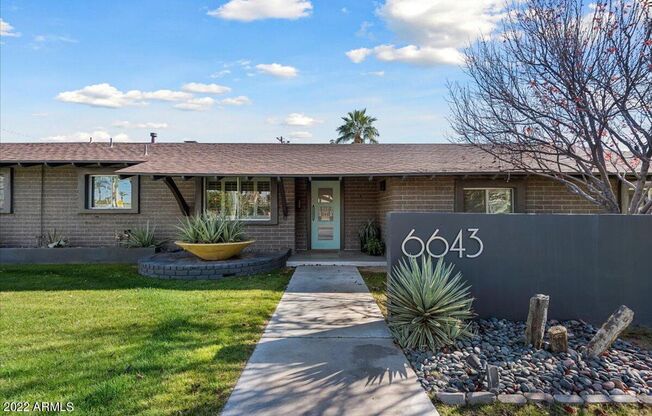 Beautiful, fully remodeled, Mid-Century modern 3 bedroom 2 bath home with pool and landscape services included!