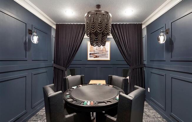 Poker table in cozy dark blue room