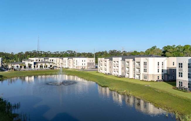 A large body of water is in front of a building.