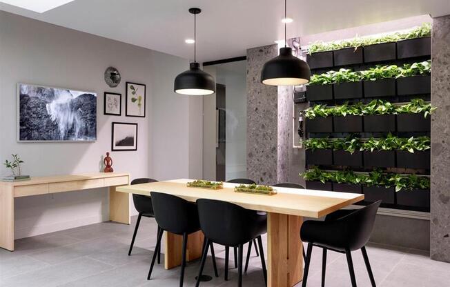 community table with living green wall