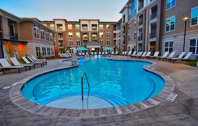 Pointe at Lake CrabTree Pool Side Relaxing Area With Sundeck in Morrisville Apartment Rentals for Rent