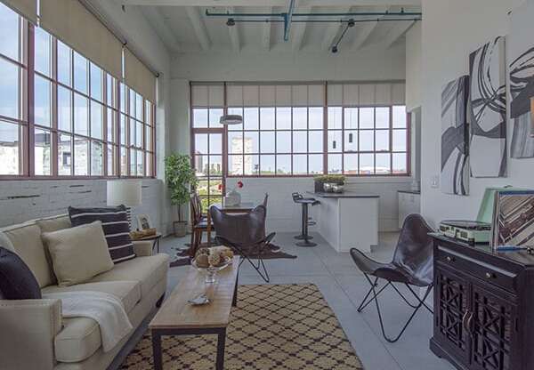 Steelcote Lofts living room with polished concrete flooring at Steelcote Square, St. Louis