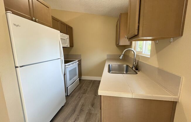 2-Bedroom Home w/ Garage, A/C, & Backyard!