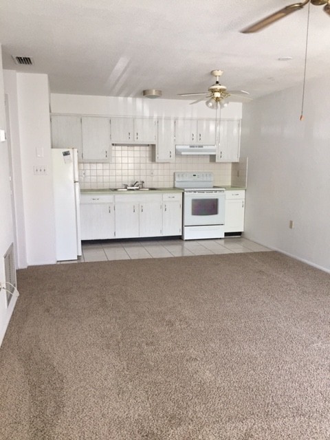 55+, quaint 2/1 in a gated community located close to employment, downtown, beaches and shopping.
