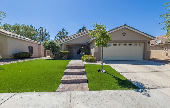 HENDERSON, GATED COMMUNITY, IMMACULATE ONE-STORY HOME WITH SOLAR PANELS INCLUDED!