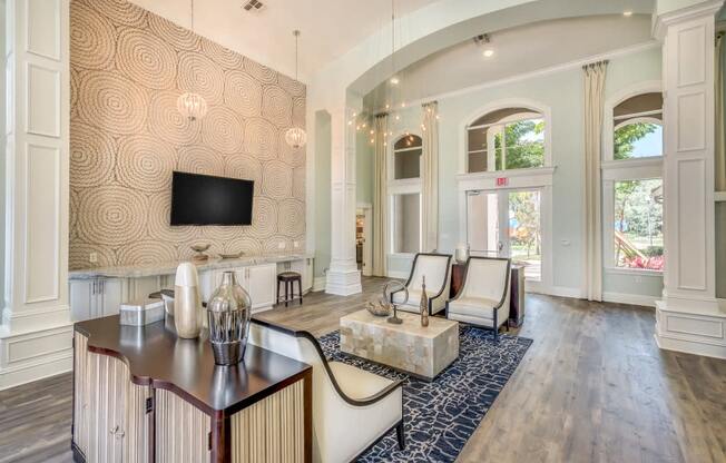 Office lobby area with tv and lounge seating