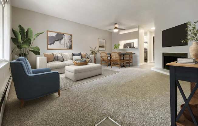A living room with a blue chair and a grey carpet.