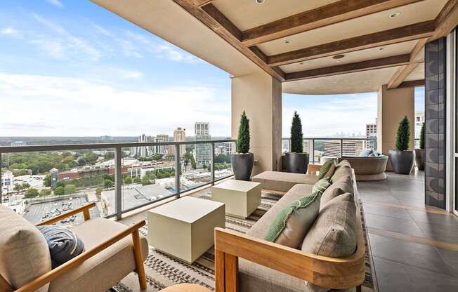 A modern living room with a view of the cityscape.