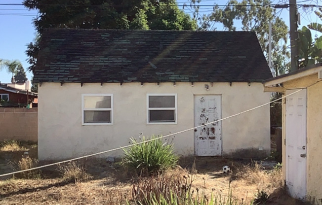 Charming 3 Bed/1.5 Bath Tudor with Spacious Yard, Garage And Classic Details