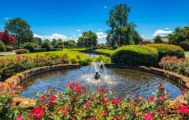 flowers and fountain at Holly Point Apartments in Chesapeake VA