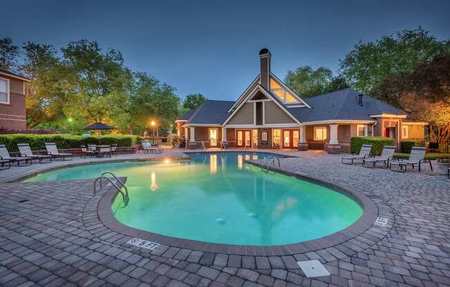 Outdoor Pool & Sundeck At Dusk