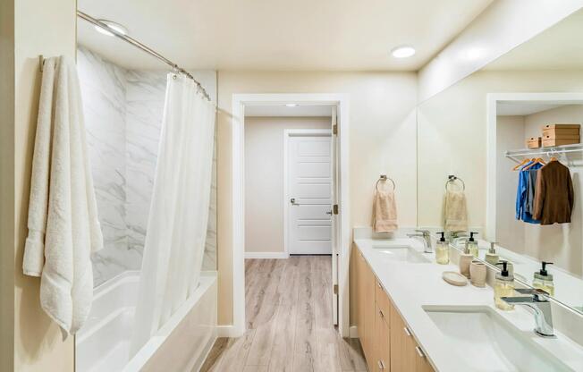 Select from multiple finish packages—each pairing sleek countertops with modern wood cabinetry—at Modera Coral Springs North Tower.