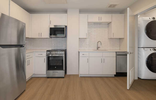 Kitchen with In-home Washer and Dryer