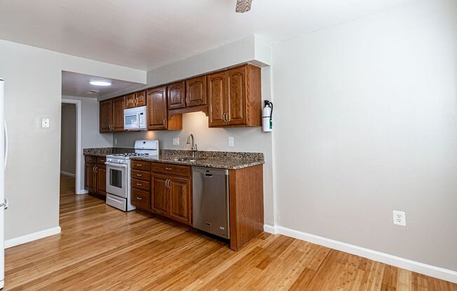 Beautiful 3-Level Townhome with Hardwood Floors & Fenced Yard