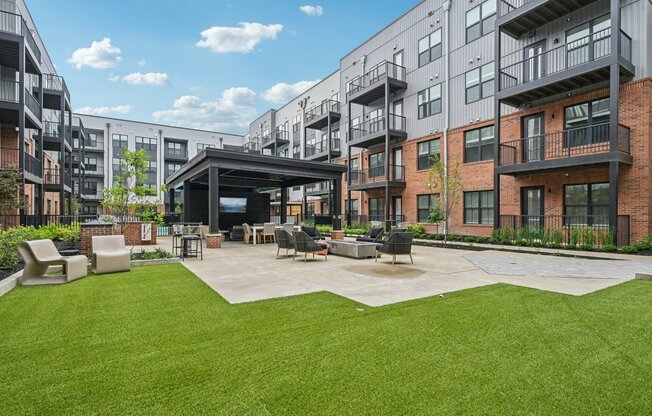 Courtyard with greenspace and TV's for residents.