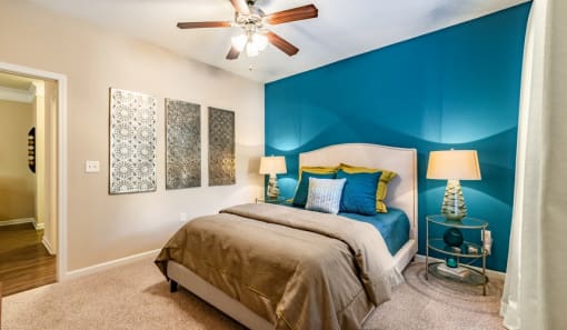 a bedroom with a bed and a ceiling fan at Echo at Lake Norman, Mooresville, NC