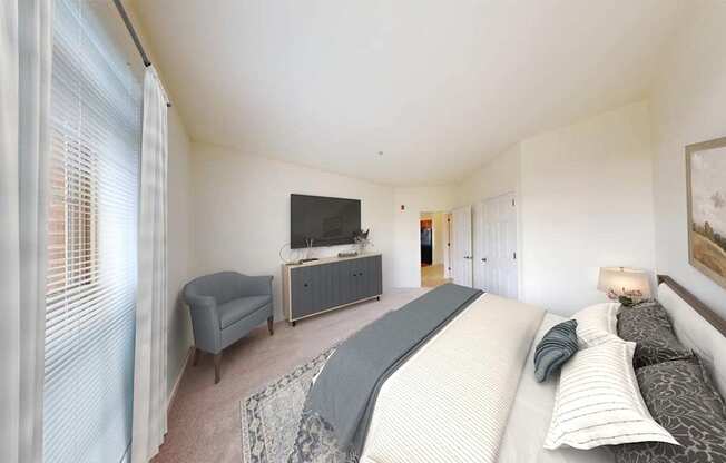 A bedroom with a large bed and a television in the corner.