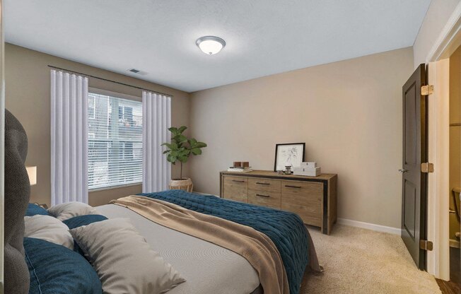 the preserve at ballantyne commons bedroom with bed and dresser
