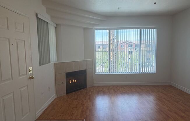 GUARD GATED TOP FLOOR PRIVATE 1 BED CONDO FEATURING A DETACHED 1 CAR GARAGE