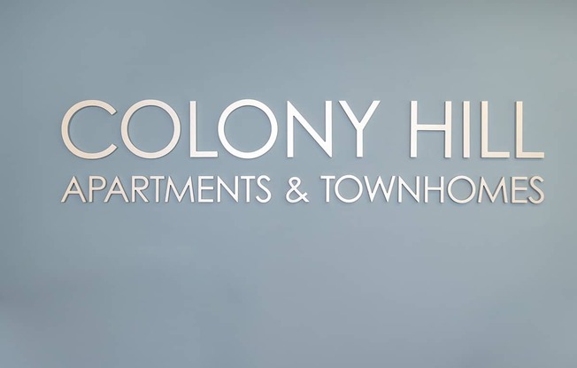 Colony Hill Apartments and Townhomes logo.