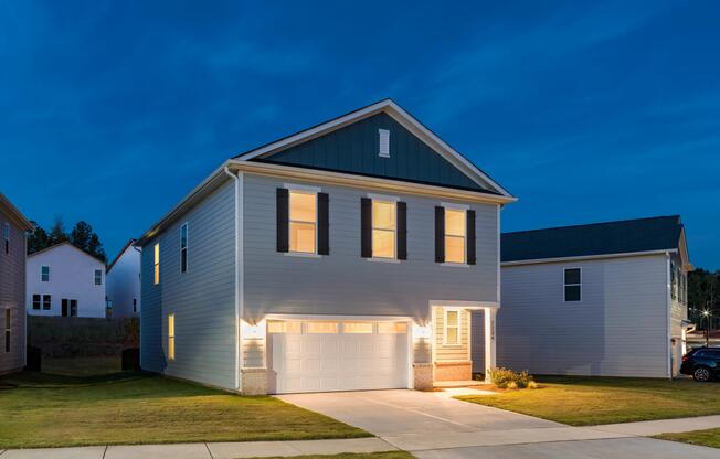 A private single-family home at Amavi Brier Creek, offering modern design, an attached garage, and a quiet Durham setting near Brier Creek conveniences.