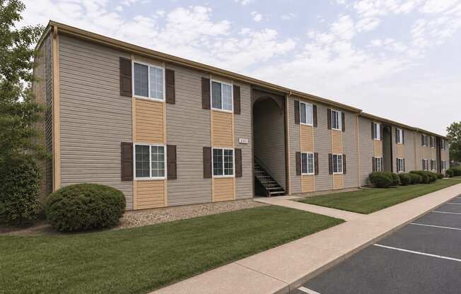A long building with a lot of windows and doors.