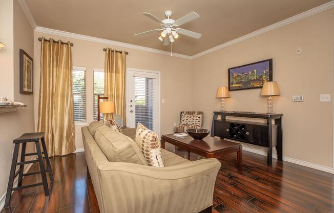 a living room filled with furniture and a fireplace