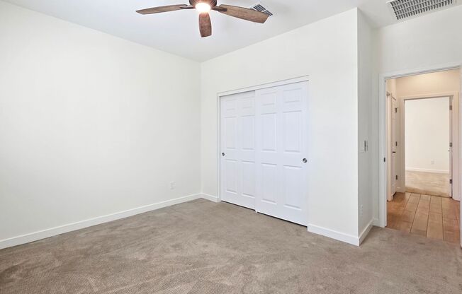 Pristine home in amenity rich Estrella Mountain Ranch!