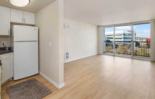 Studio with Balcony and Hard Surface Flooring